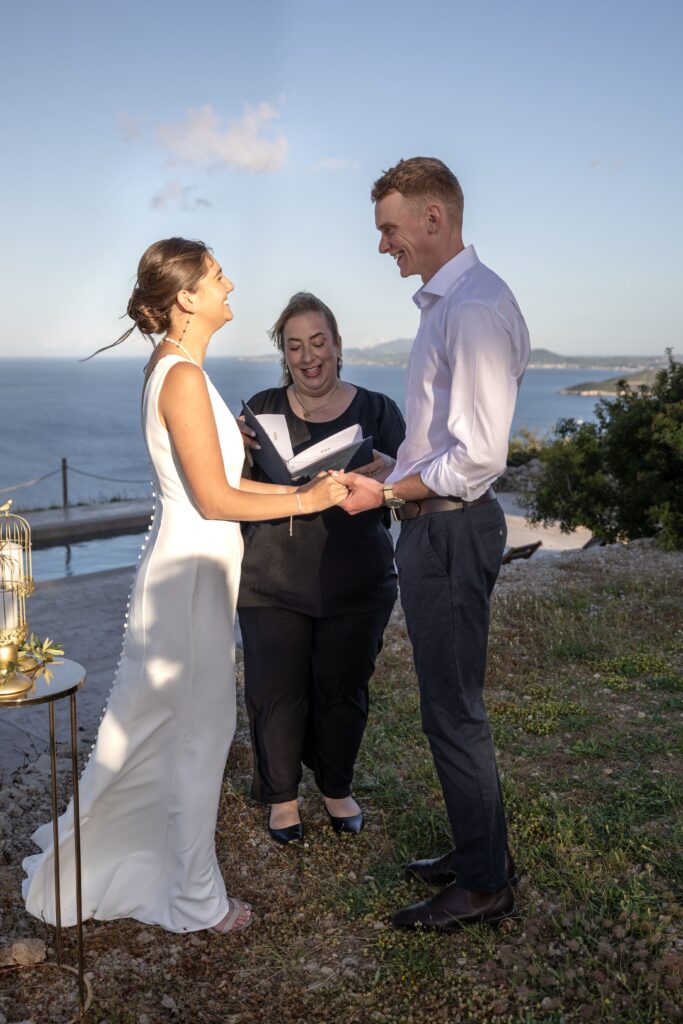 wedding couple with wedding celebrant, Roussa, in Greece